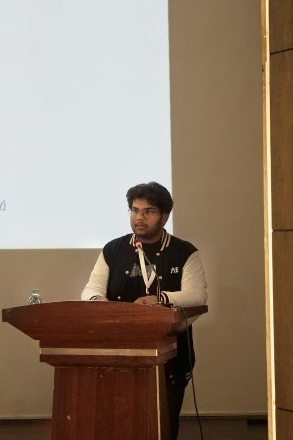 Me presenting at a podium during Sandbox